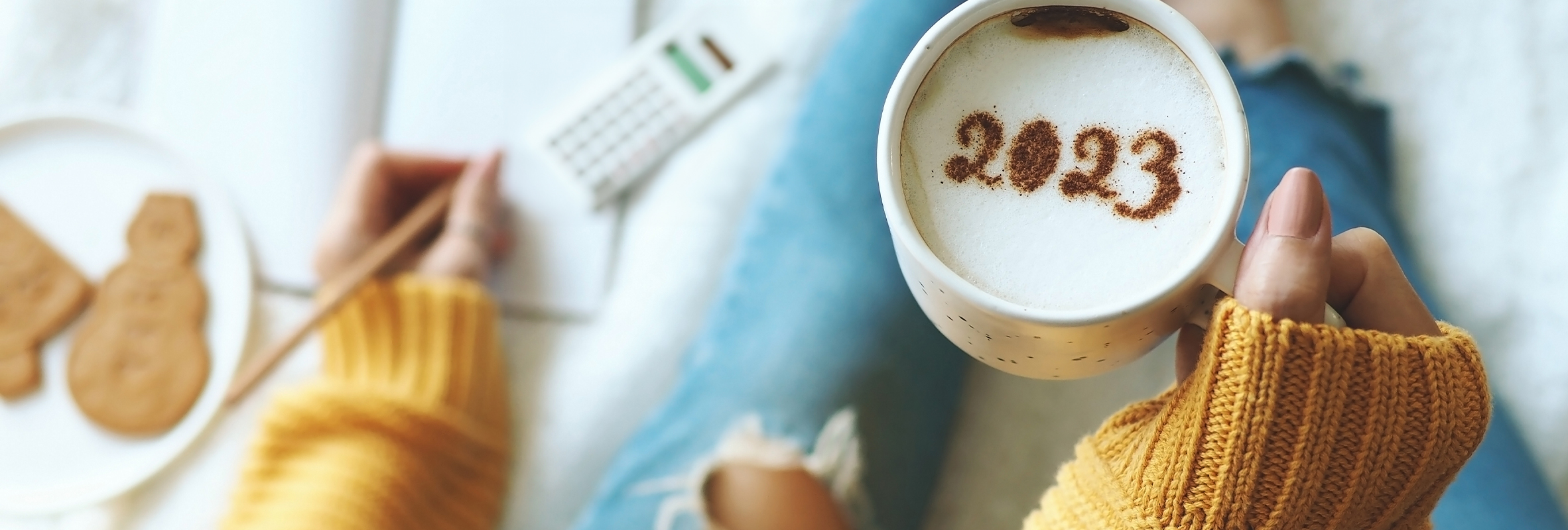 girl drinking coffee going over expenses