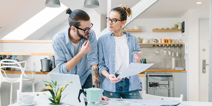  couple reviewing their finances 