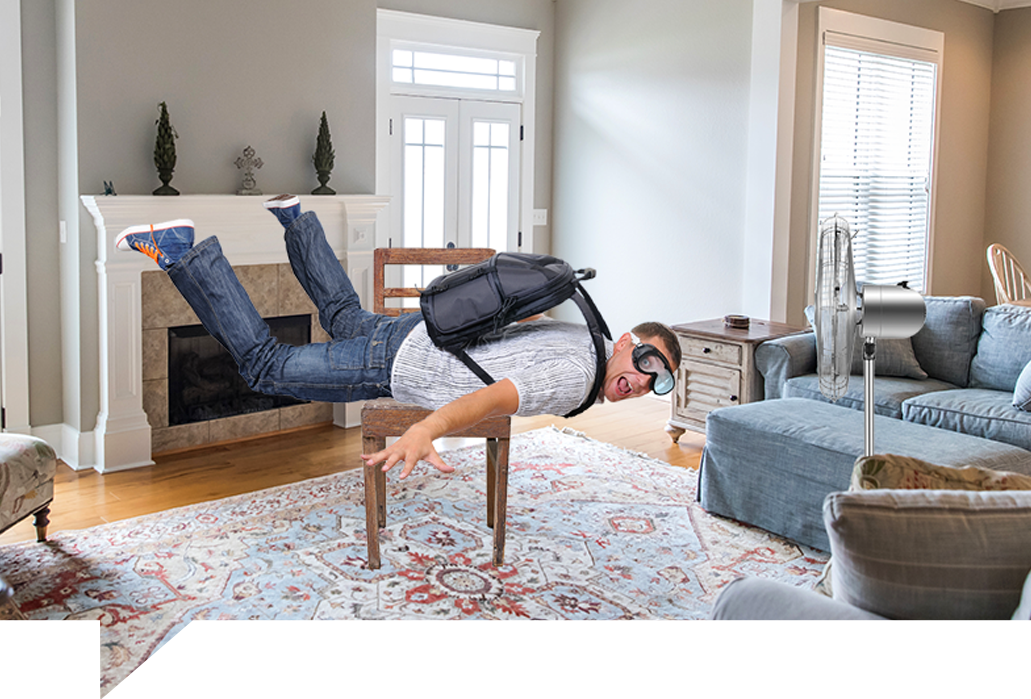 Man skydiving in living room 