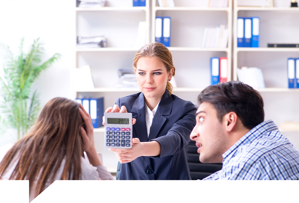 Couple sitting with financial advisor