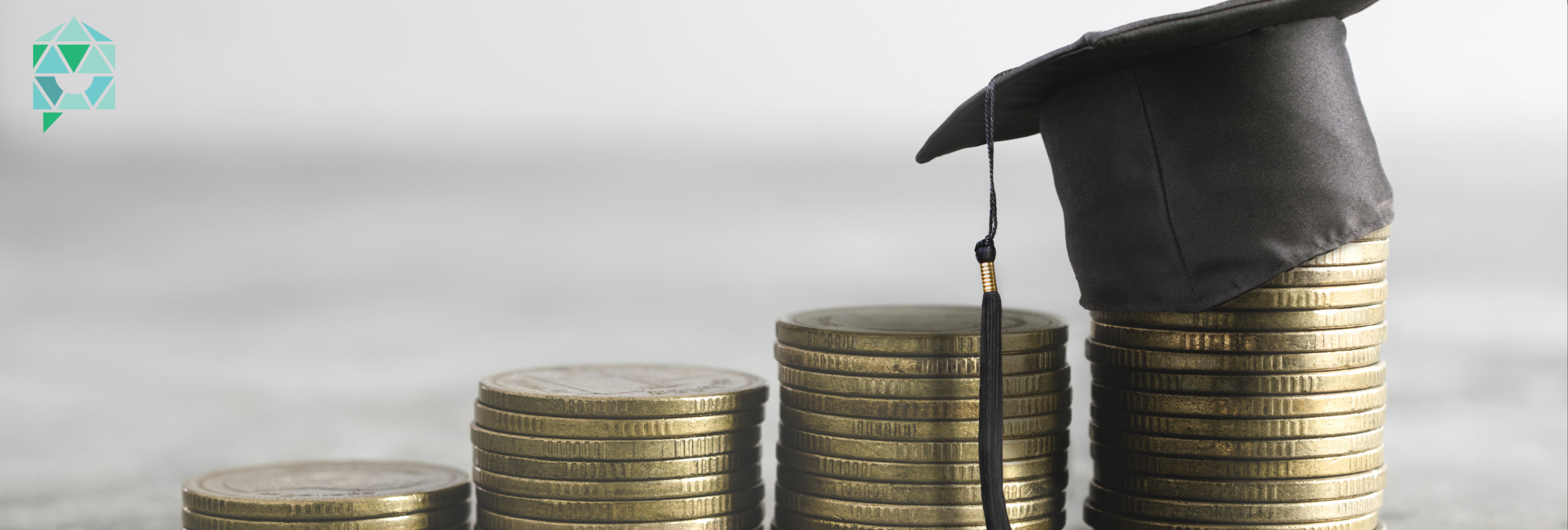 graduation cap on cash