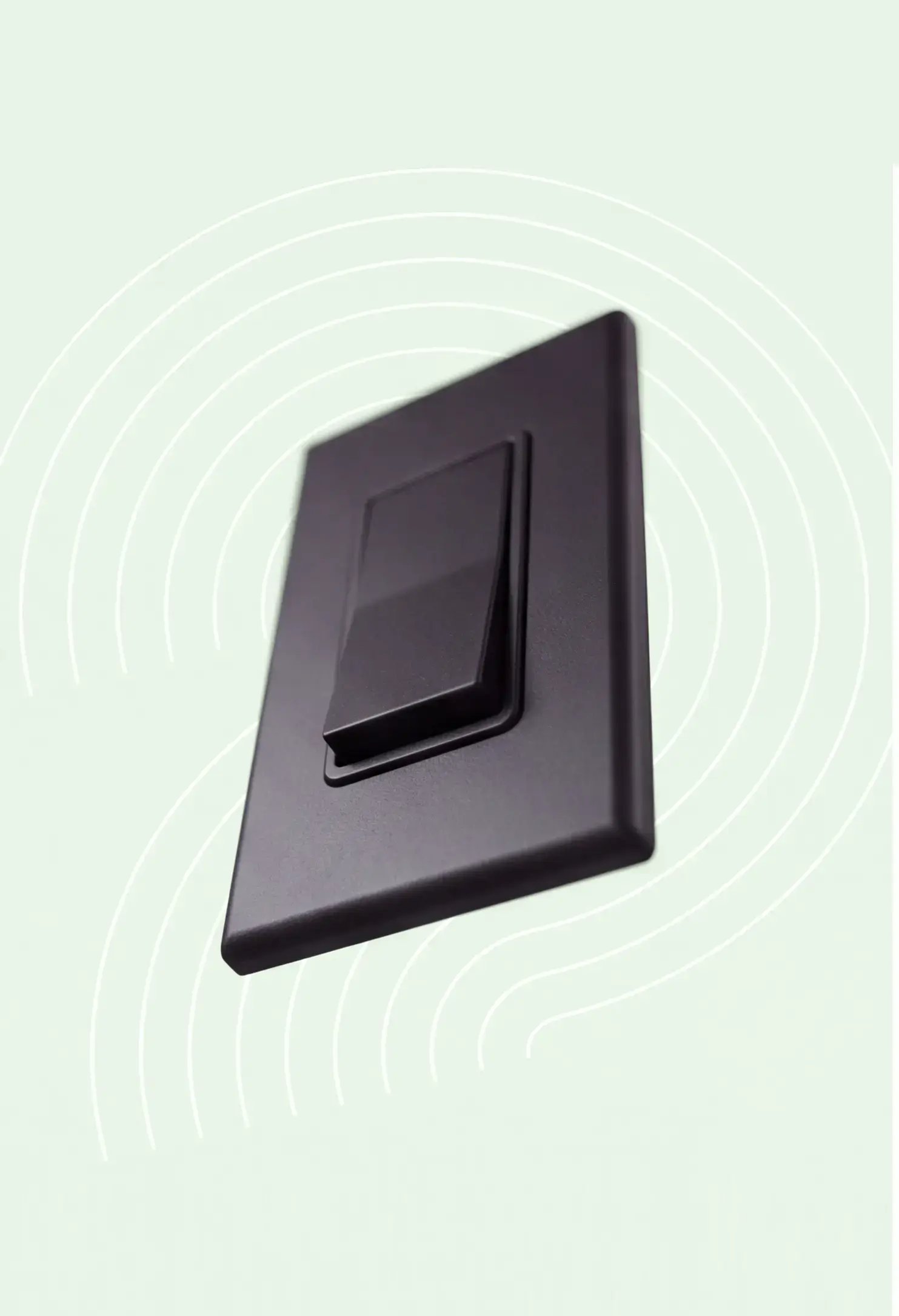 A black light switch on a green background with geometric designs