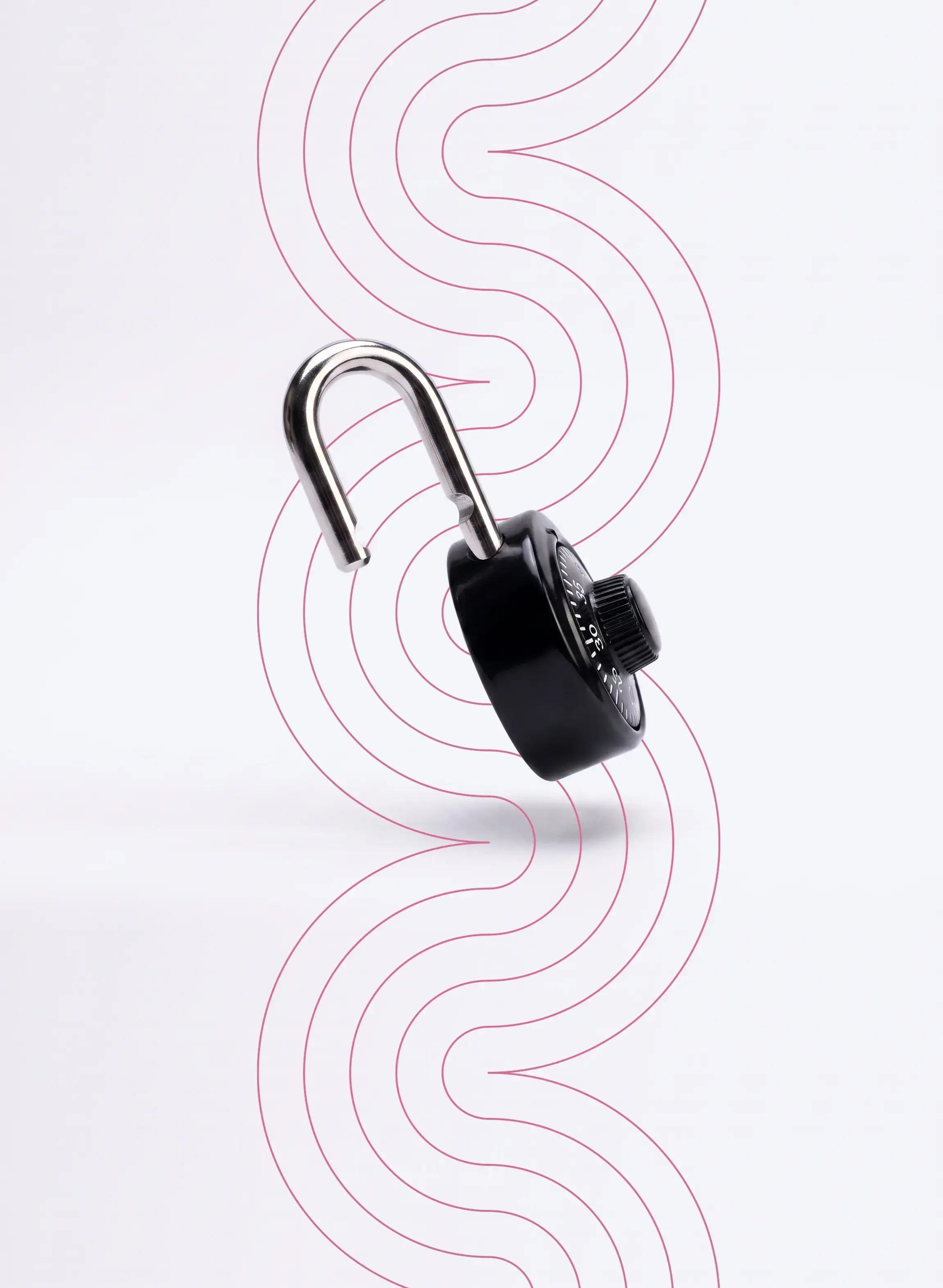 A photo of an open lock on a pale pink background with geometric designs