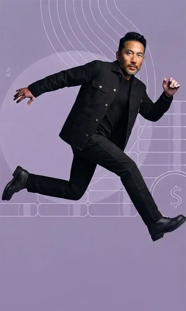 Asian-man-in-black-jumping
