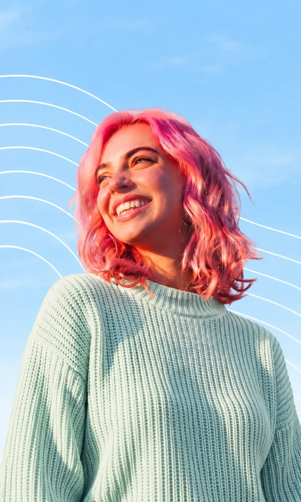 A woman with pink hair smiling with the sun shining on her face on a light blue background with thin wavy designs