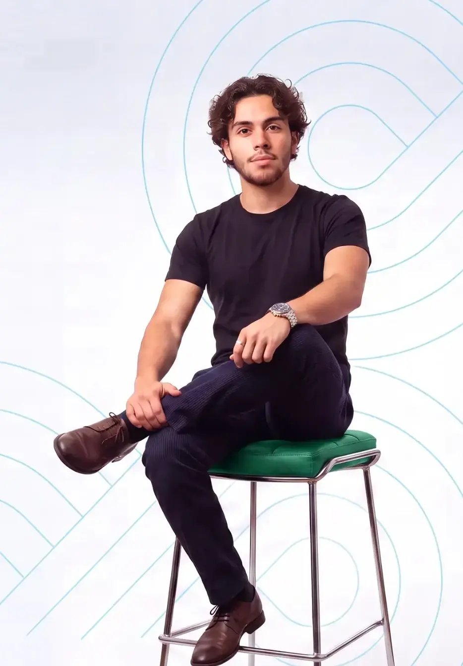 young-man-sitting-on-stool