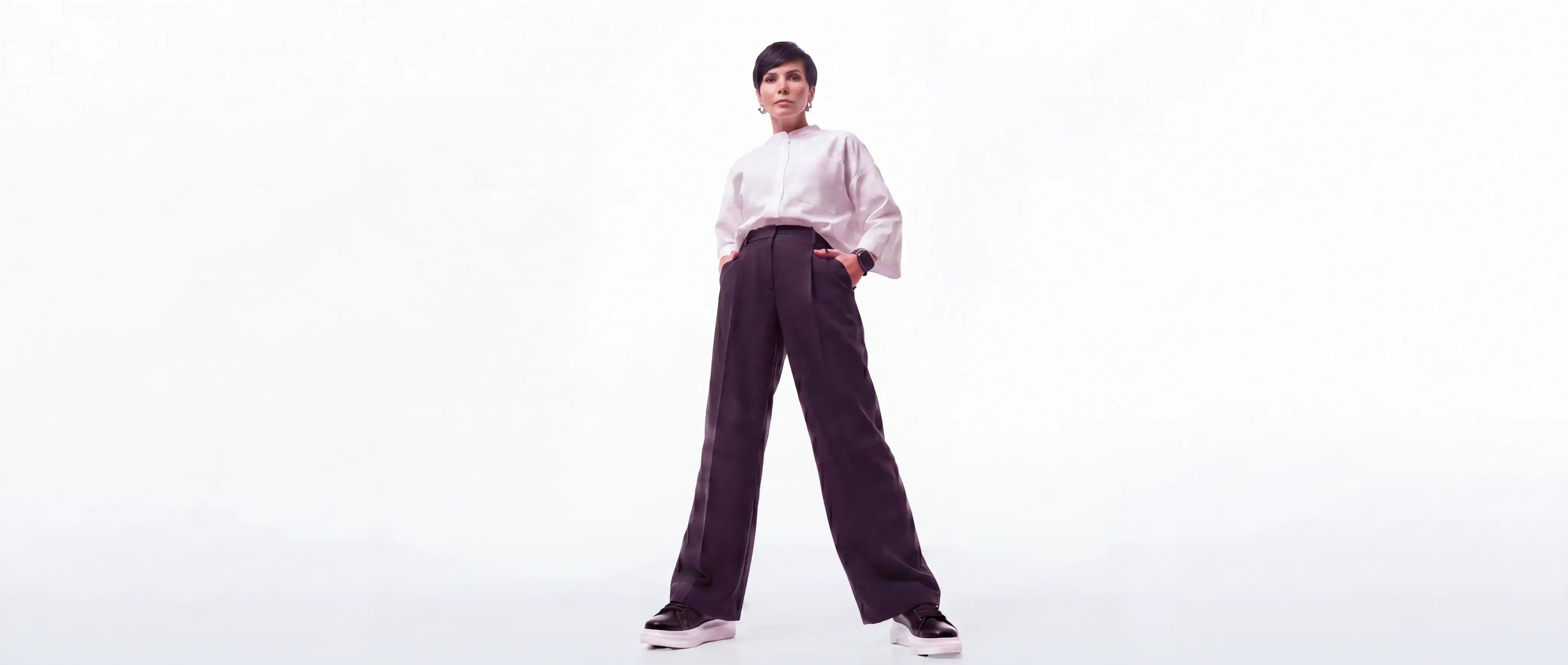 Mature-business-woman-in-sneakers