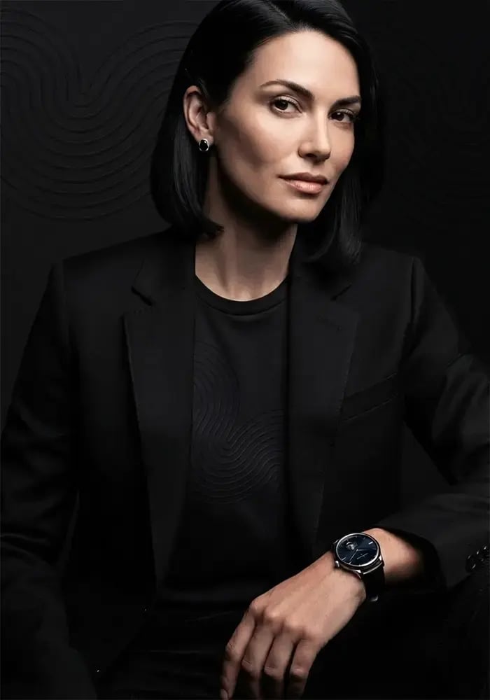Woman-in-black-suit-and-black-background