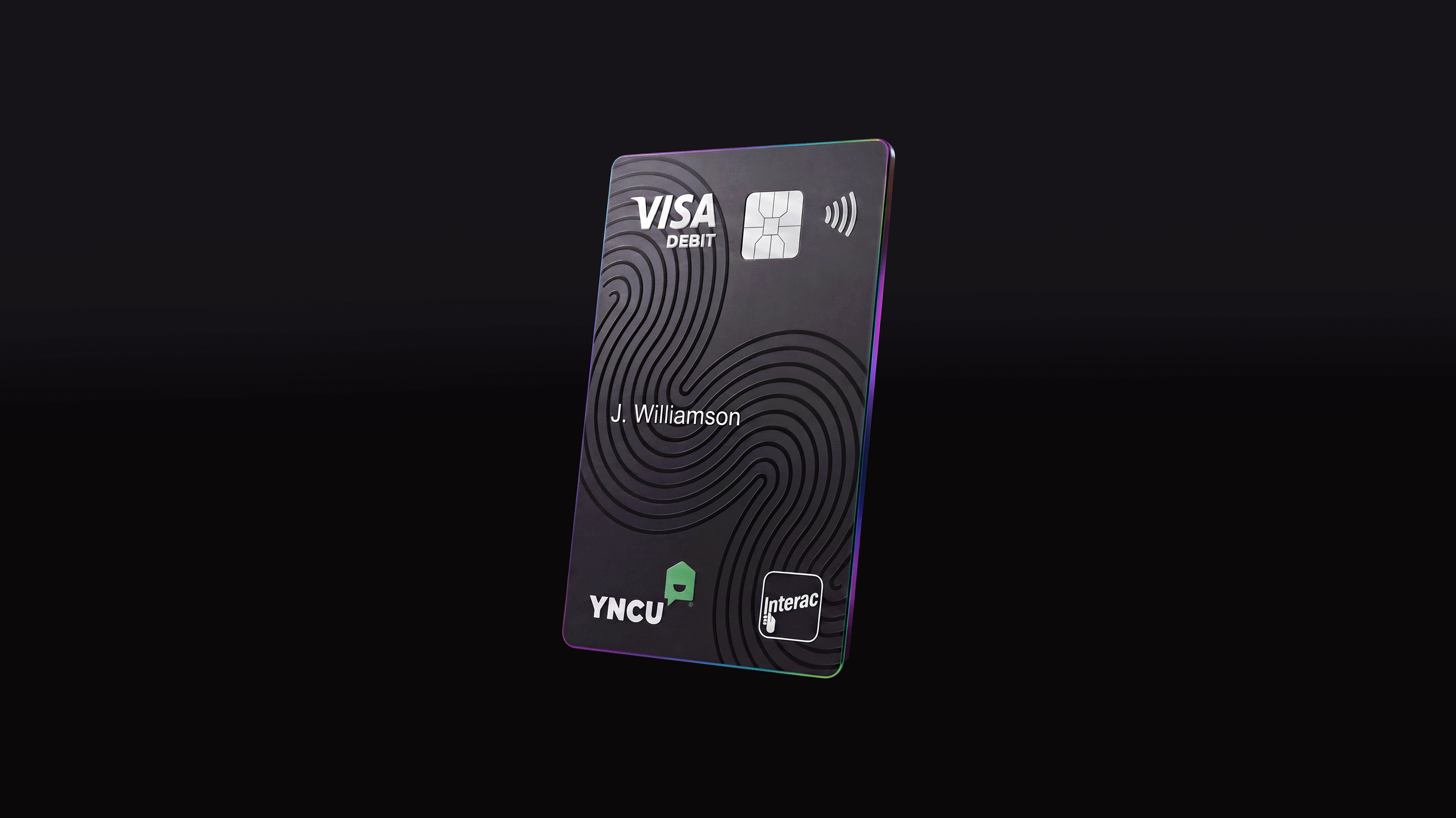 Black YNCU Visa Debit card with a chip, contactless payment symbol and Interac logo on a black background
