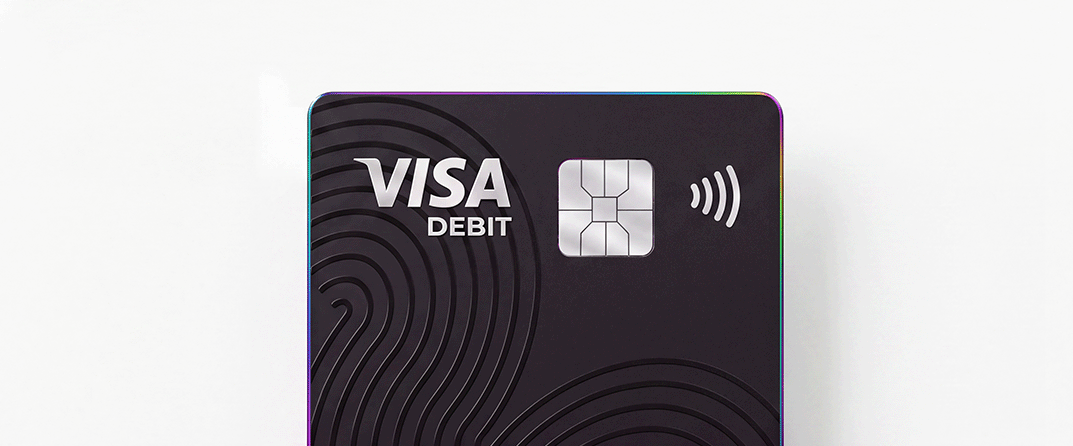 The top of a black YNCU Visa Debit card with a chip and tap technology