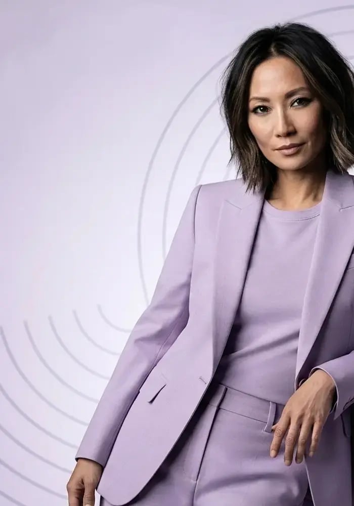 Mature-asian-woman-in-violet-suit